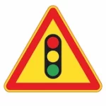 Panneau de signalisation temporaire annonçant des feux tricolores